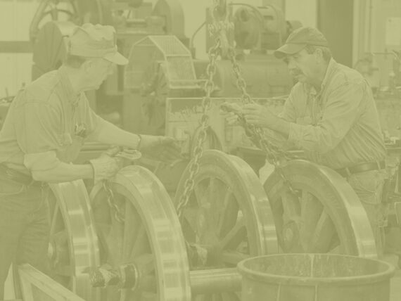 Train Shop Specialist changing out the tires of a historic steam locomotive at Tweetsie Railroad